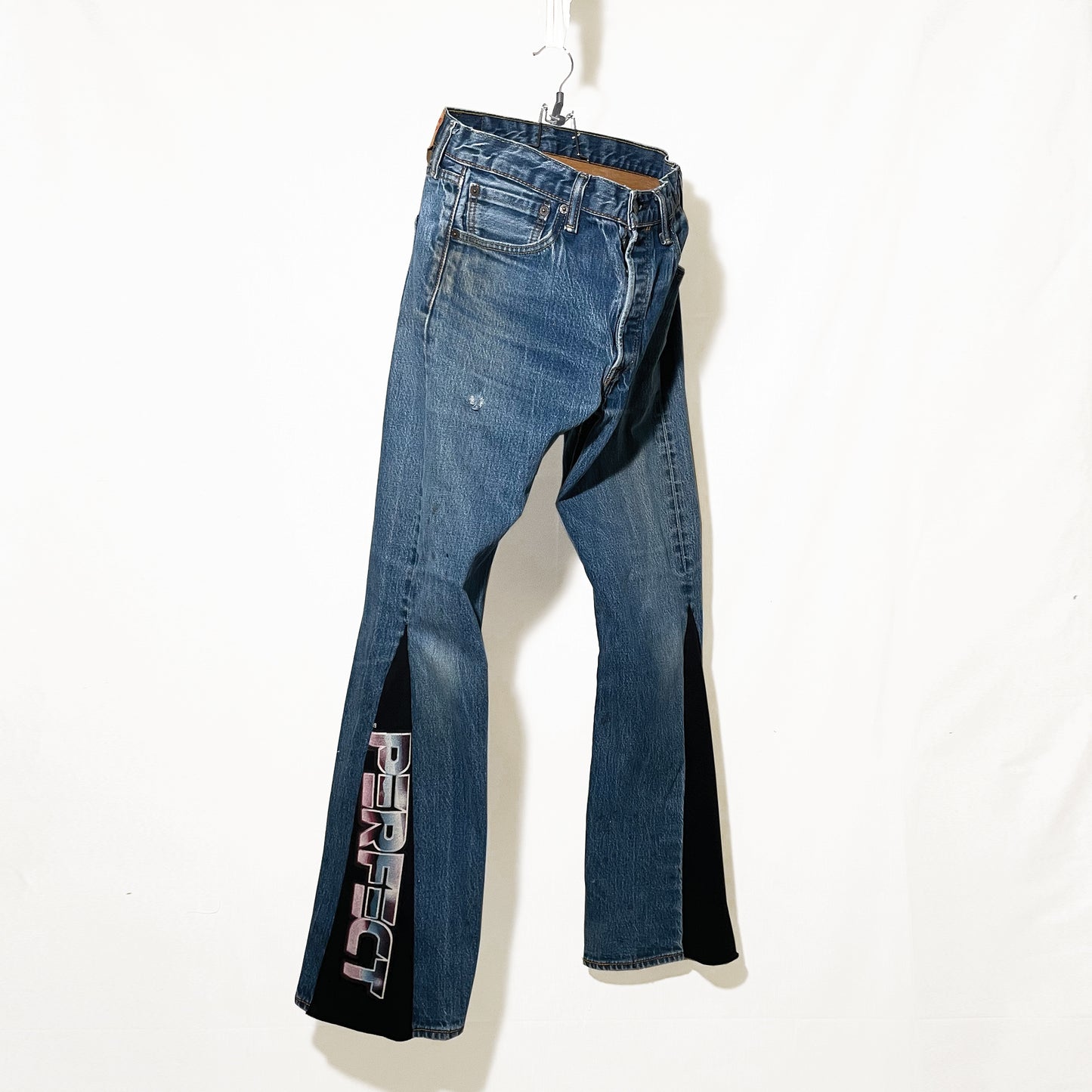 REWORKED FLARE JEANS